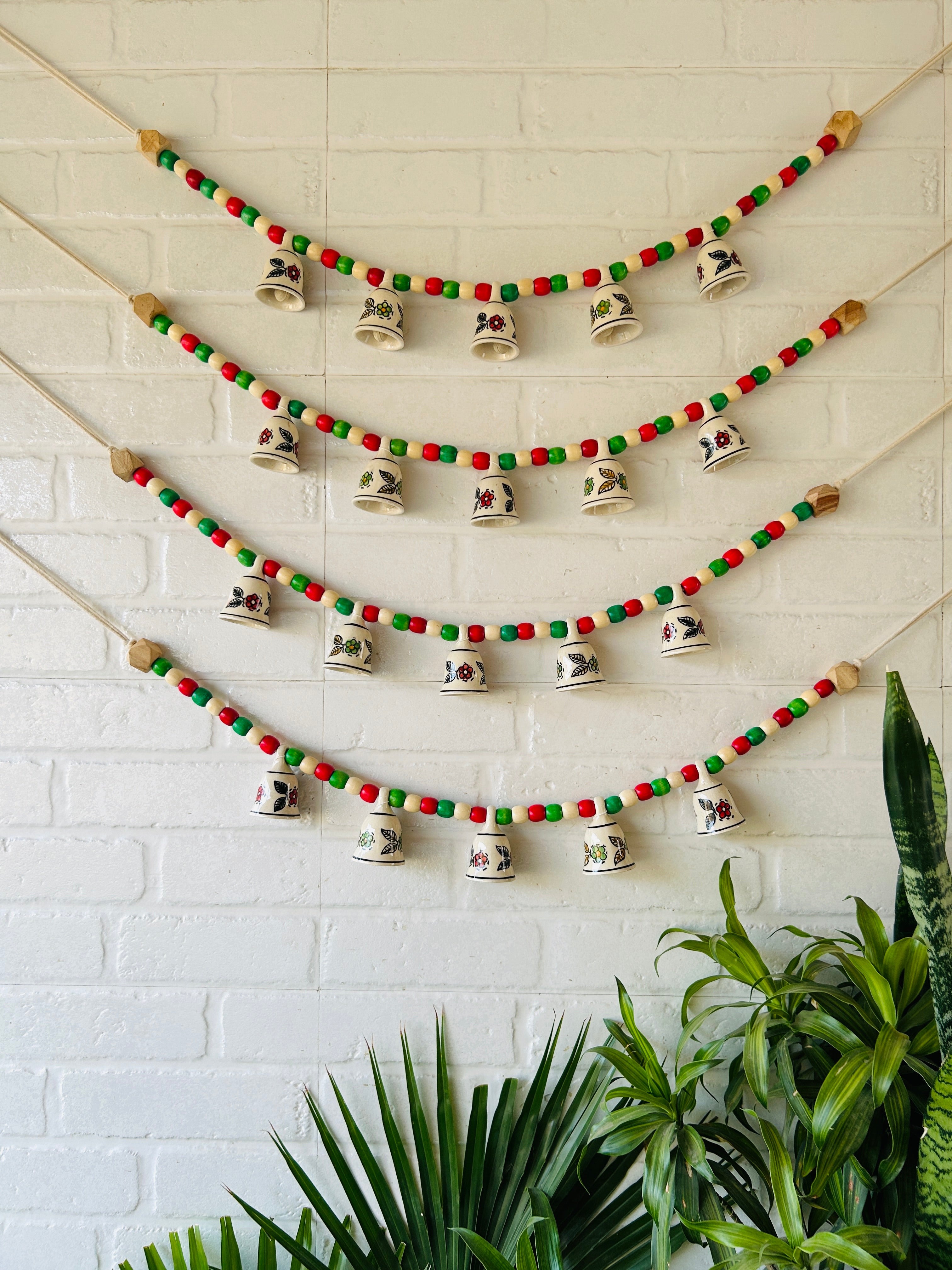 KHANAK | Ceramic bells bunting - INDIAN ROSE