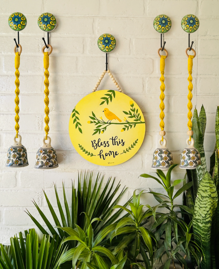 Bless this home wall set up with four Lemon Yellow macrame bells and ceramic hooks