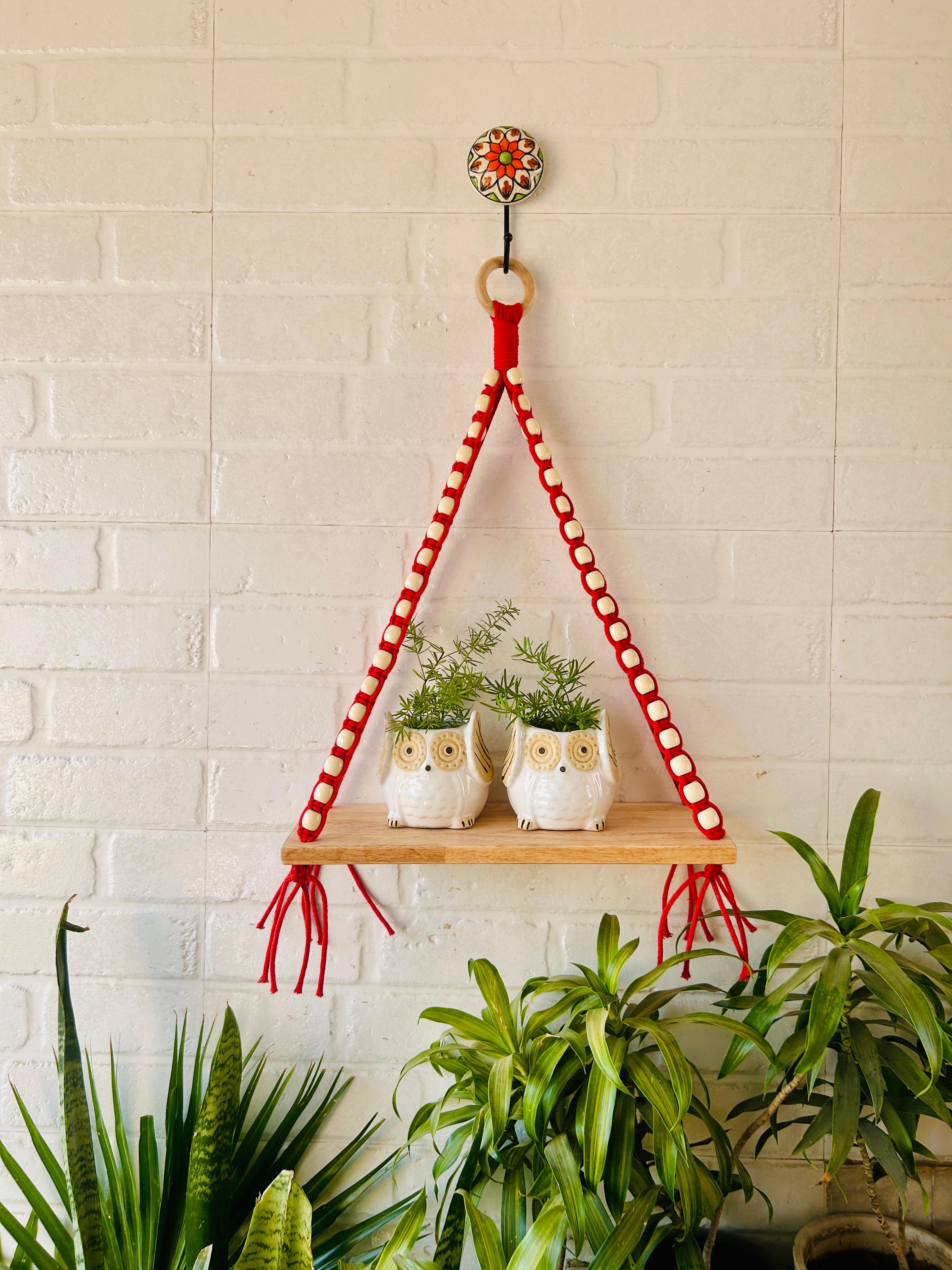 Colorful Macrame and beads shelf with two ceramic planters and one ceramic hook