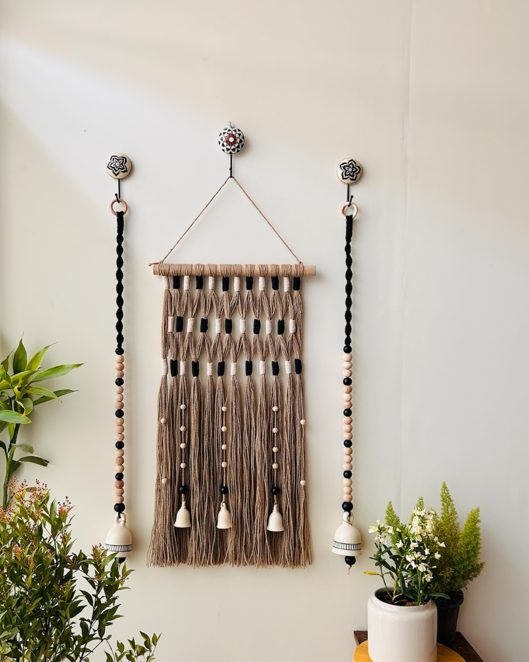 Monochrome Tapestry Wall Set up with ceramic bells and hooks