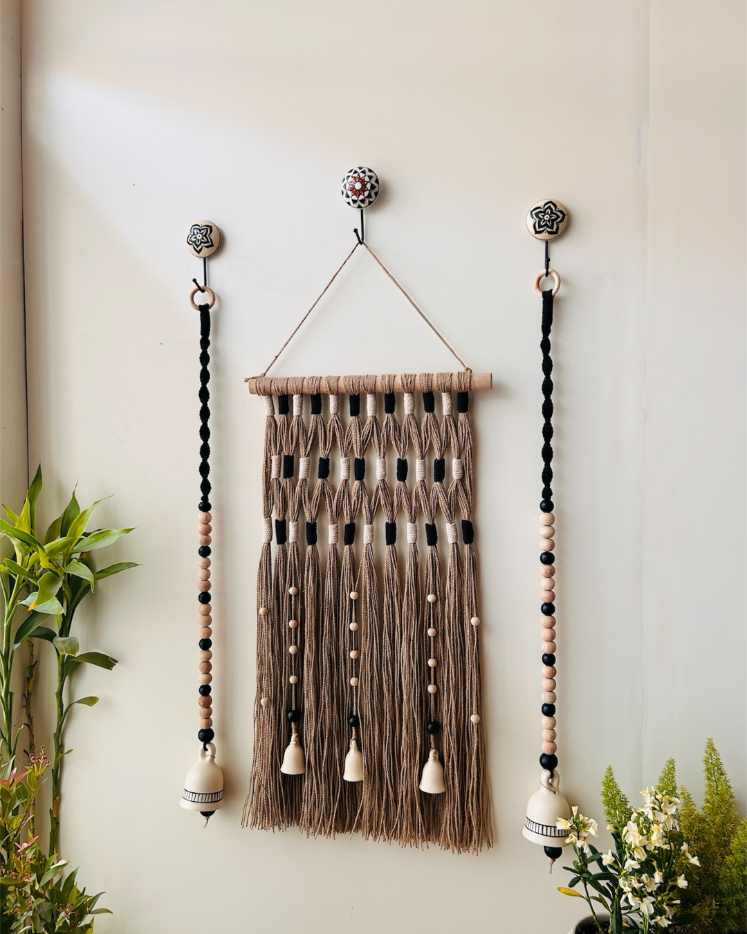 Monochrome Tapestry Wall Set up with ceramic bells and hooks