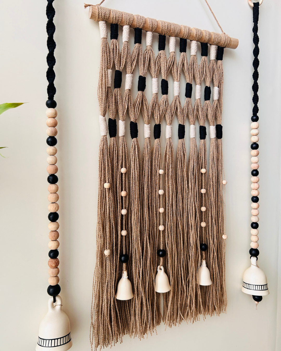 Monochrome Tapestry Wall Set up with ceramic bells and hooks