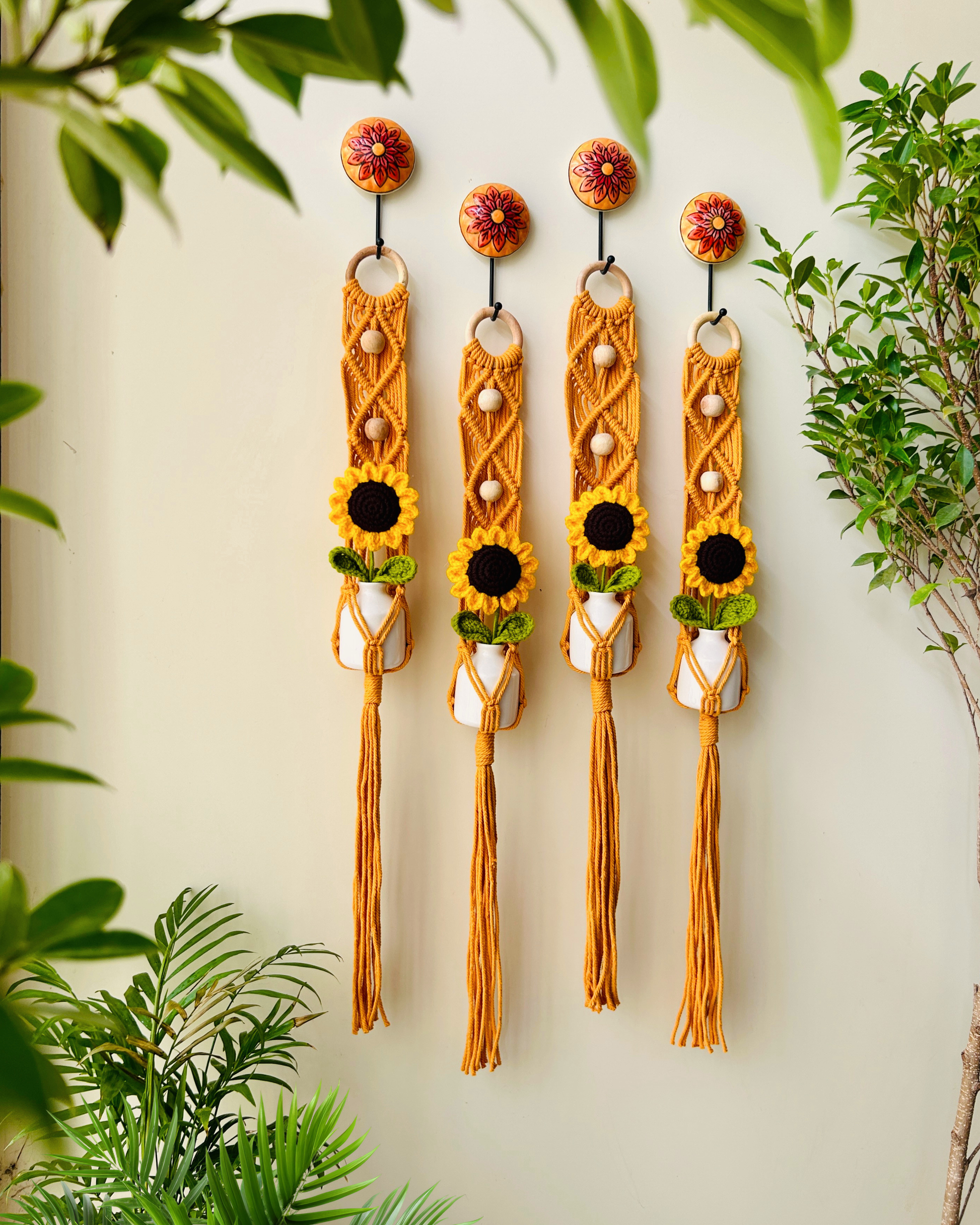 Mac-crochet Collection | Macrame plant hangers with crochet SUNFLOWERS in ceramic bottle vases