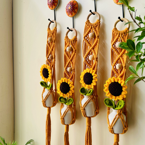 Mac-crochet Collection | Macrame plant hangers with crochet SUNFLOWERS in ceramic bottle vases
