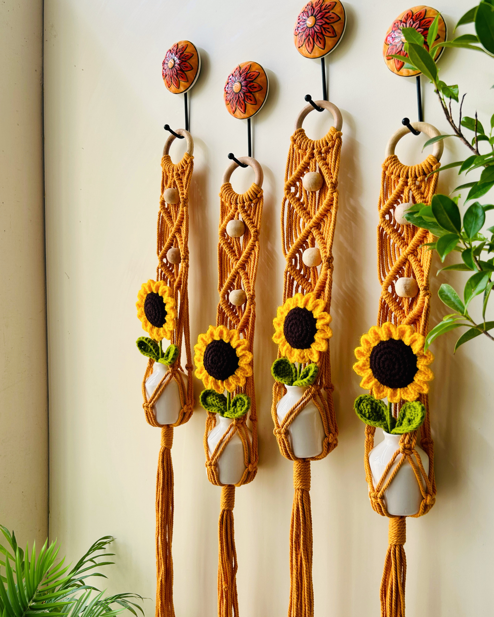 Mac-crochet Collection | Macrame plant hangers with crochet SUNFLOWERS in ceramic bottle vases