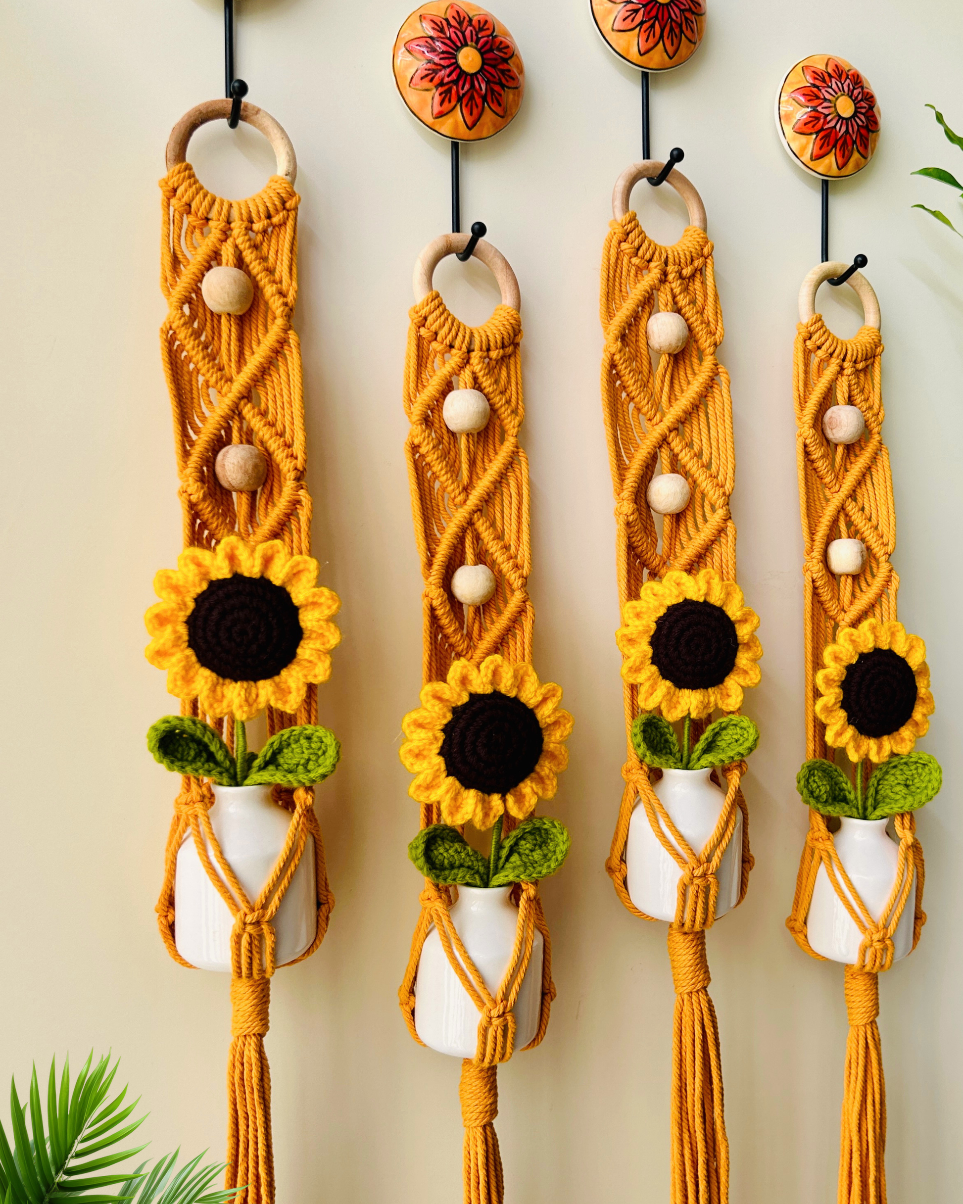 Mac-crochet Collection | Macrame plant hangers with crochet SUNFLOWERS in ceramic bottle vases