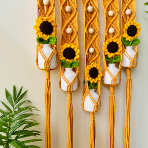 Mac-crochet Collection | Handmade Sunflower Macrame Wall Hanging with hand knitted crochet flowers and ceramic white bottle vases