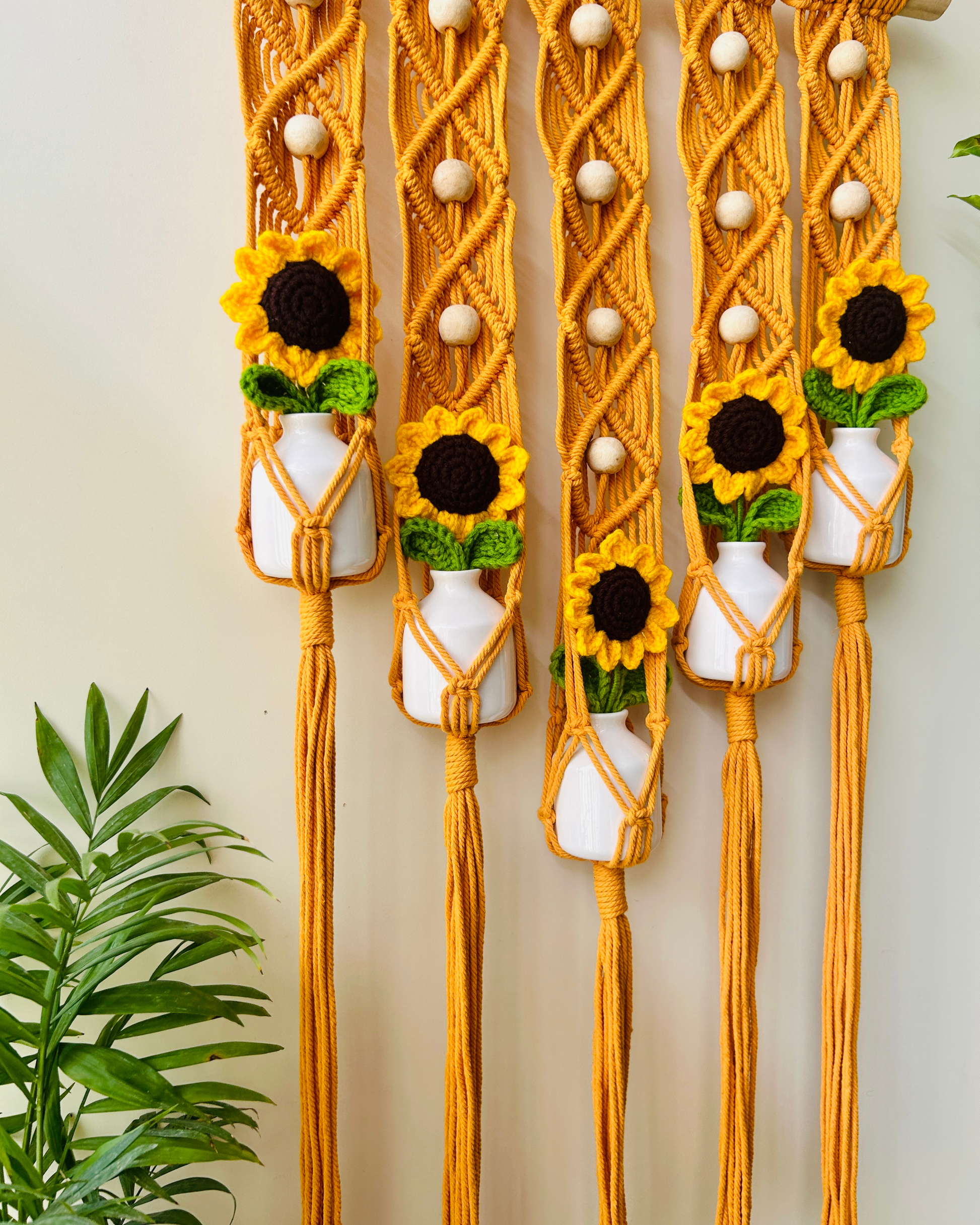 Mac-crochet Collection | Handmade Sunflower Macrame Wall Hanging with hand knitted crochet flowers and ceramic white bottle vases