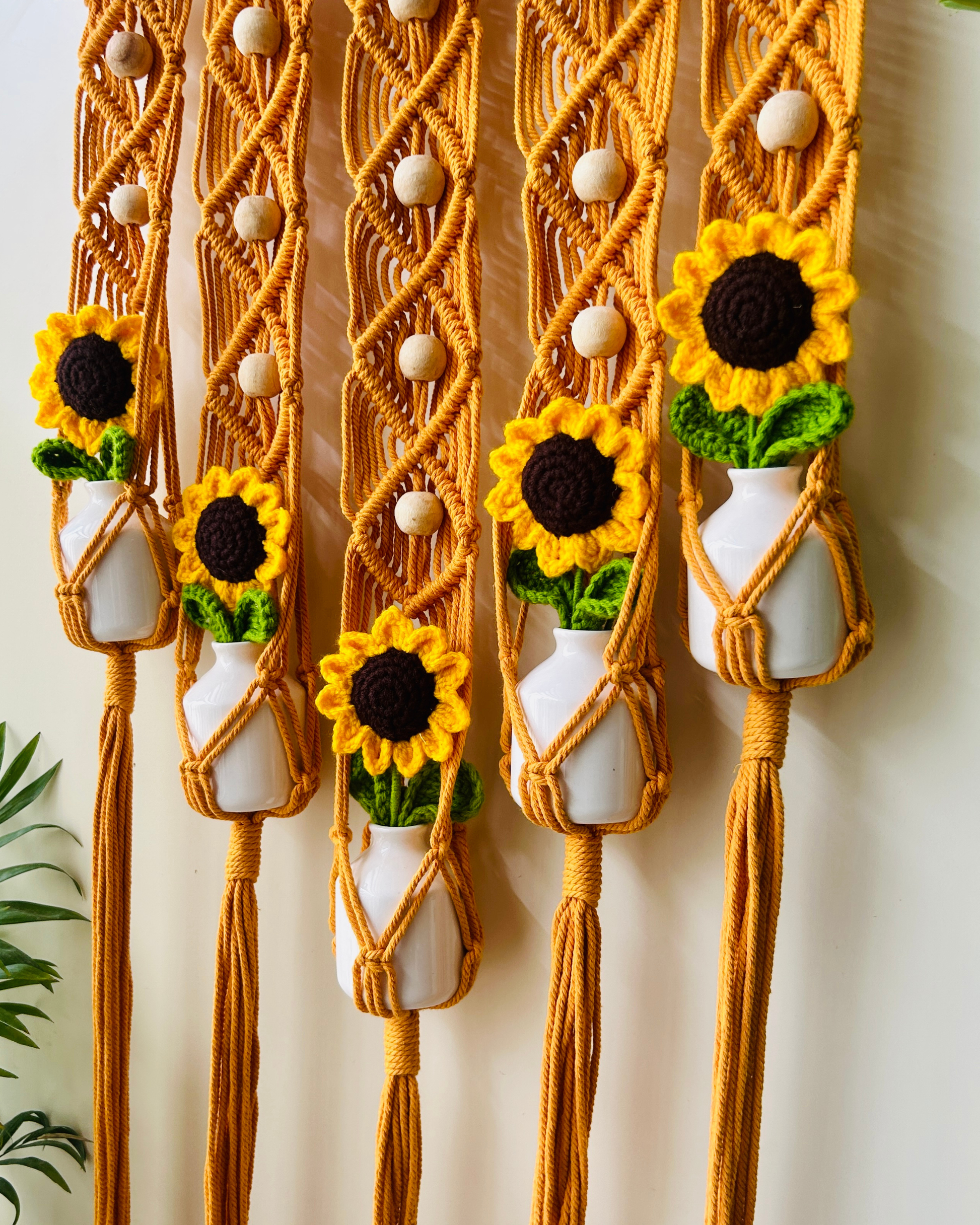 Mac-crochet Collection | Handmade Sunflower Macrame Wall Hanging with hand knitted crochet flowers and ceramic white bottle vases