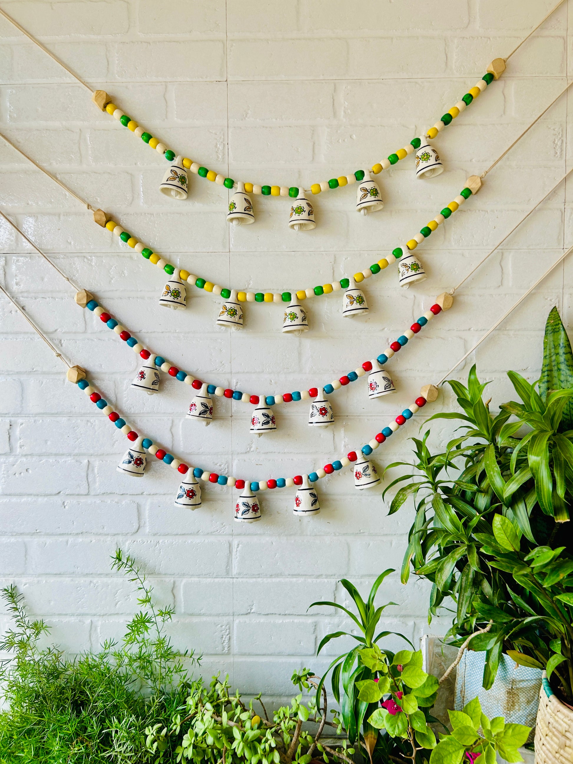 KHANAK | Ceramic bells bunting  - AMALTAS