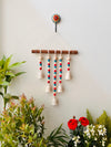 IVORY GULMOHAR | Beads and Bells Wall hanging | 5 beaded bells on a wooden dowel with ceramic hook | Handmade Decor