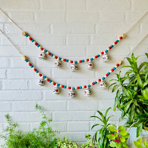 KHANAK | Ceramic bells bunting  - GULMOHAR