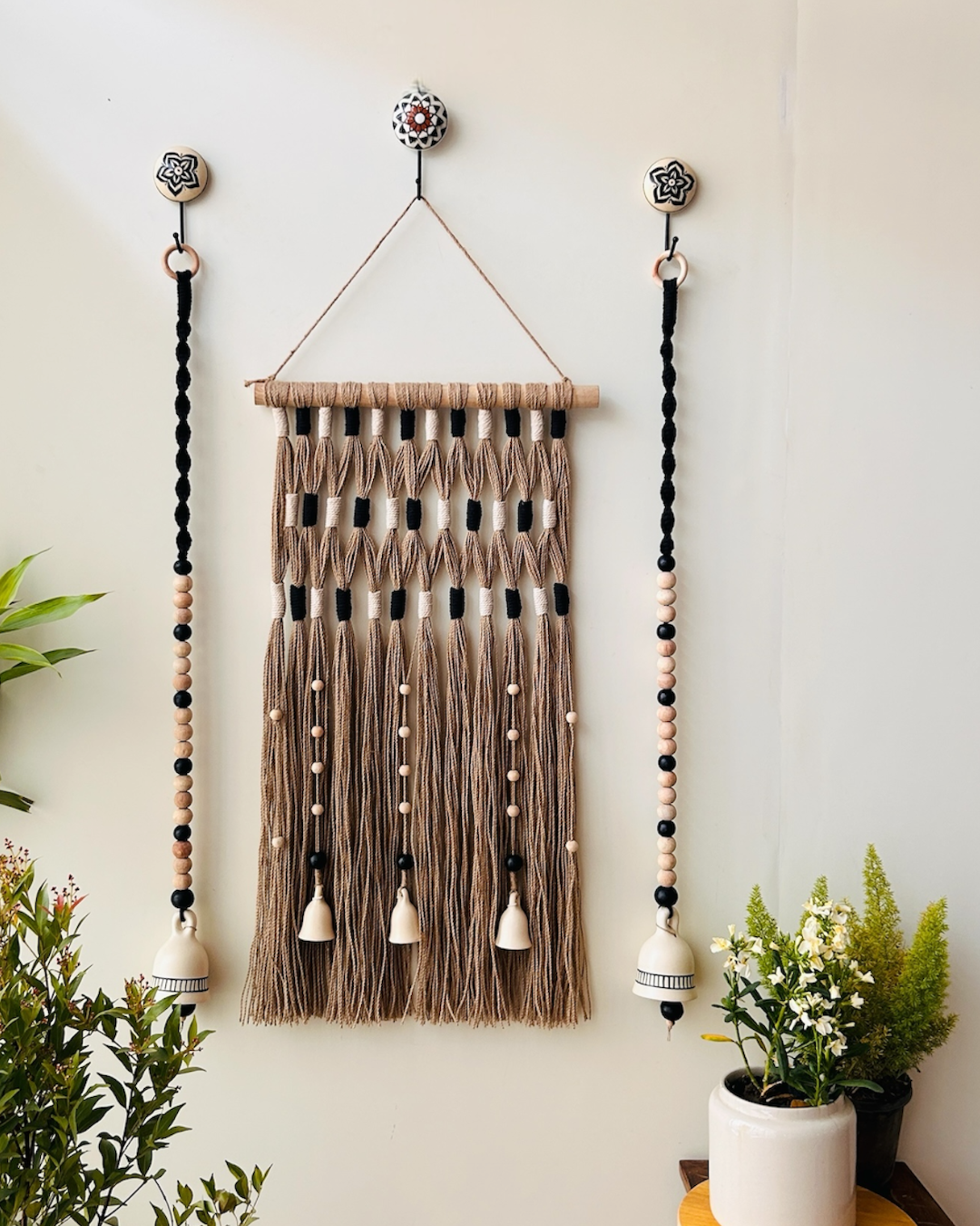 Monochrome Tapestry Wall Set up with ceramic bells and hooks