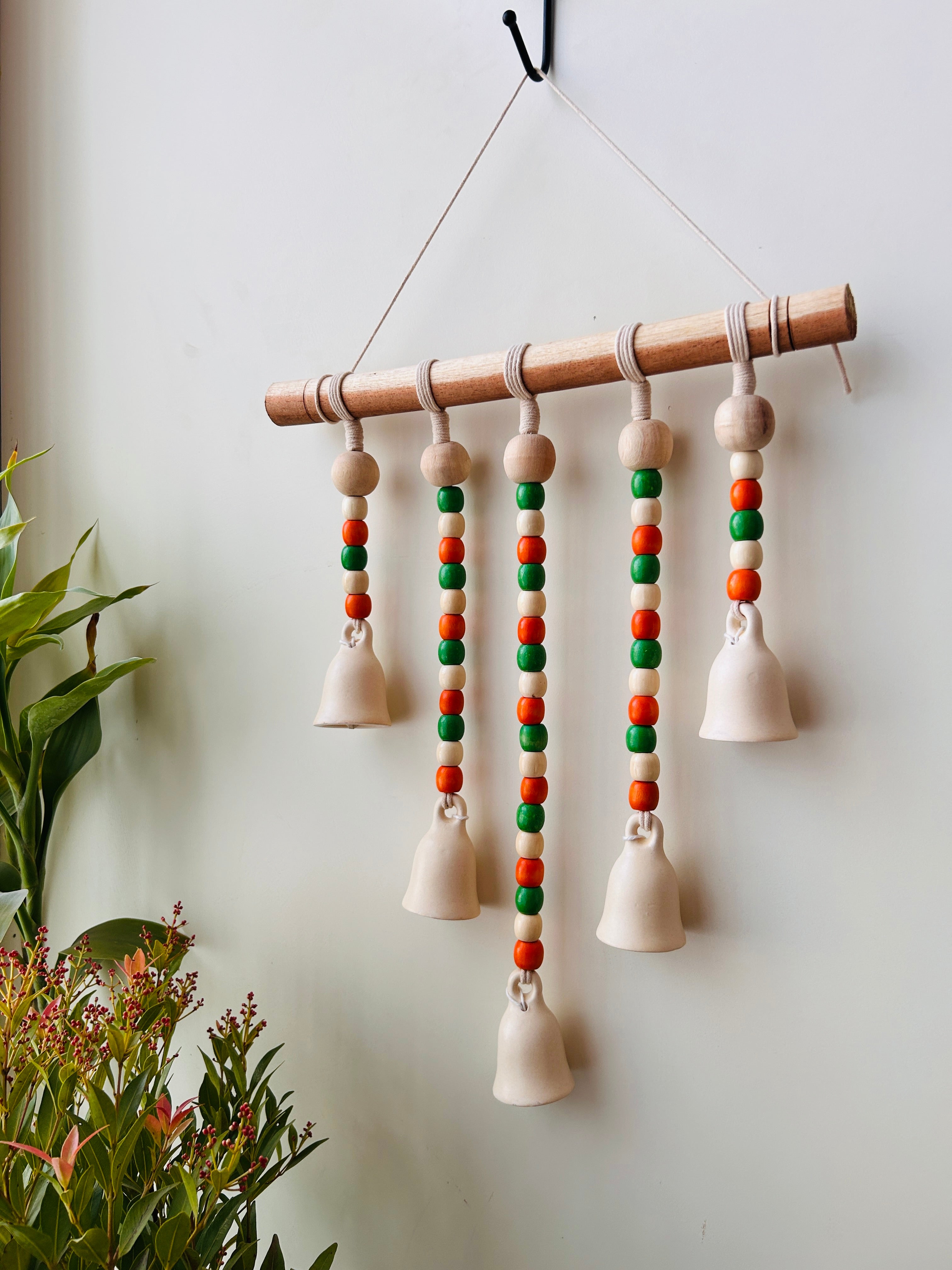 IVORY MARIGOLD | Beads and Bells Wall hanging | 5 beaded ceramic bells on a wooden dowel with ceramic hook | Handmade Decor