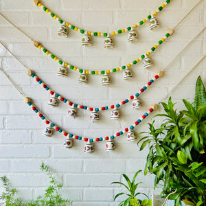 KHANAK | Ceramic bells bunting  - GULMOHAR