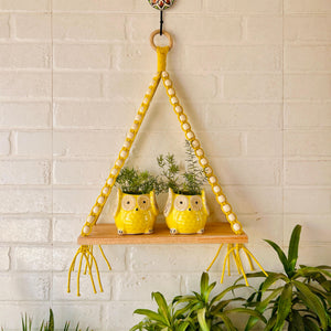 Colorful Macrame and beads shelf with two ceramic planters and one ceramic hook
