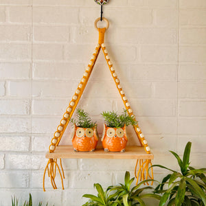 Colorful Macrame and beads shelf with two ceramic planters and one ceramic hook