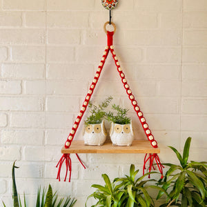 Colorful Macrame and beads shelf with two ceramic planters and one ceramic hook