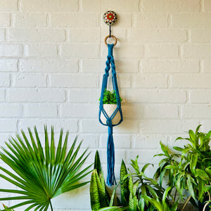 Colorful Macrame Plant Hangers with classic white ceramic pots and ceramic hook