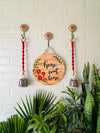 Home sweet home wall set up with two Red macrame bells