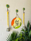 Good vibes only wall set up with two lemon yellow macrame bells