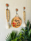 Home sweet home wall set up with two beaded bells