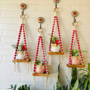 Pink Beaded Mini Shelves with ceramic hooks and ceramic owl planters