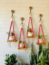 Pink Beaded Mini Shelves with ceramic hooks and ceramic owl planters