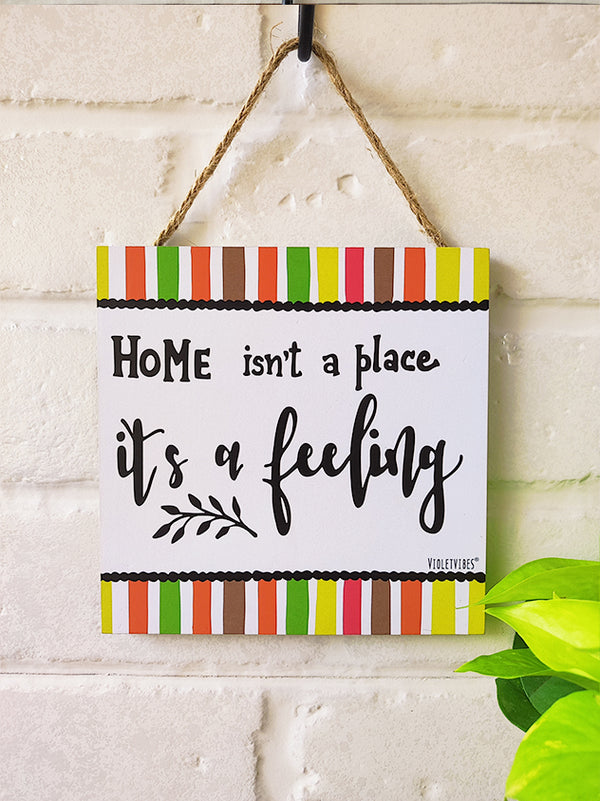 Home isn't a place its a feeling | 6 inches Square Hangings or Stick-ons