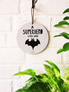 A superhero lives here | 6 inches Round Hangings