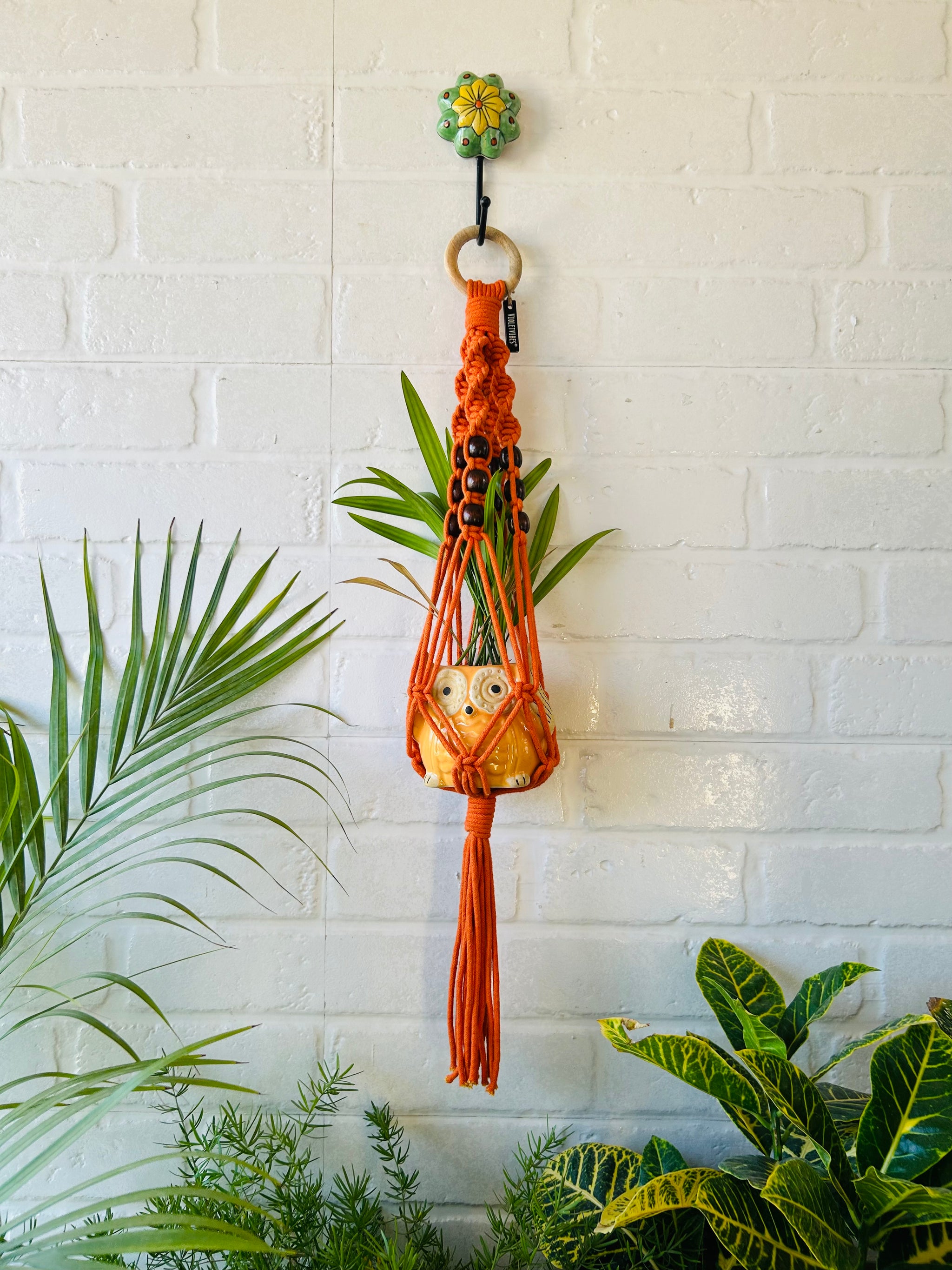 orange macrame plant hanger Top Spiral Macrame Plant Hangers with ceramic pots and ceramic hooks