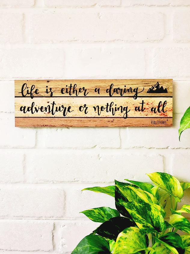 Life is either a daring adventures or nothing at all  | 13 x 4 inches rectangular plank