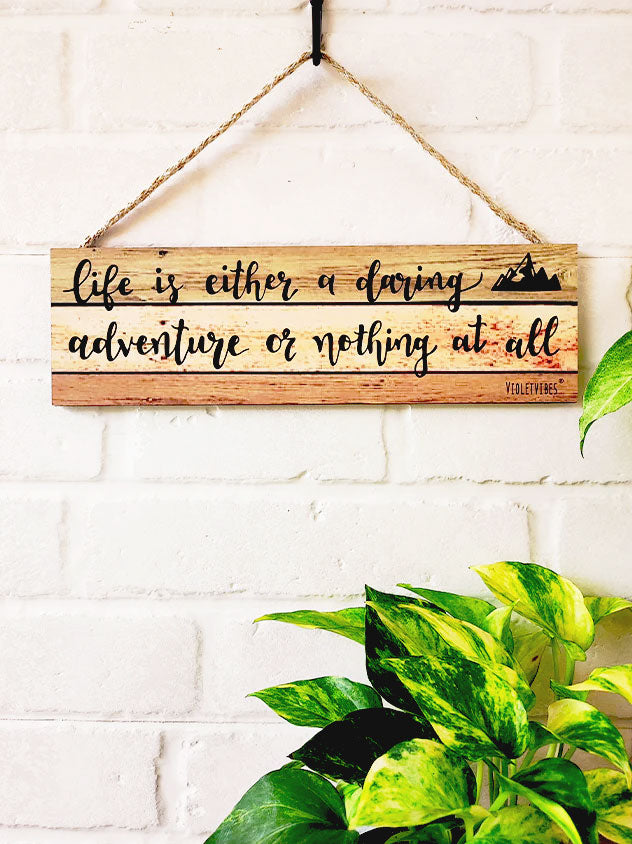 Life is either a daring adventures or nothing at all  | 13 x 4 inches rectangular plank