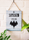 A superhero lives here | 9 x 7 inches Wooden Boards