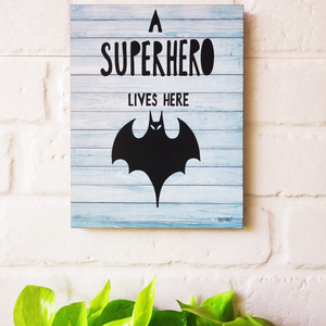 A superhero lives here | 9 x 7 inches Wooden Boards