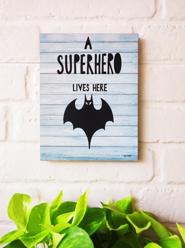 A superhero lives here | 9 x 7 inches Wooden Boards